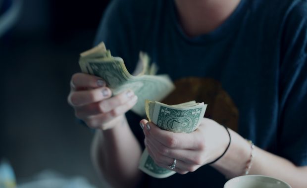 Person sorting money